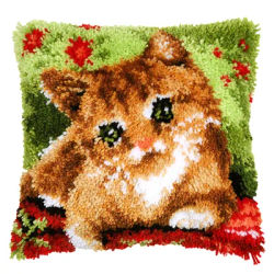 Devant de coussin au point noué "chat dans un pré"