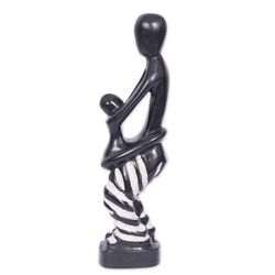 'Hand-Carved Wood Sculpture Featuring a Mother and a Child'