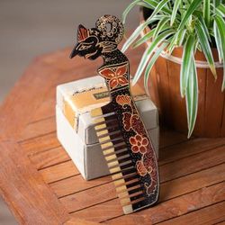The Wayang,'Folk Art-Themed Batik Pule Wood Wayang Comb Wall Accent'