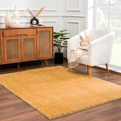 Heavenly 6'7" x 9' Modern Dark Gold Area Rug - Hauteloom