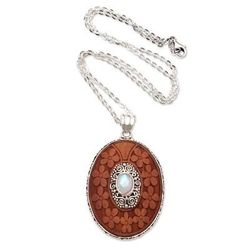 Portrait of a Lady,'Rainbow Moonstone Pendant Necklace with Floral Motif'