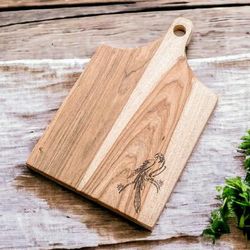Macaw's Delicacies,'Handcrafted Laurel Wood Cutting Board with Macaw Engraving'