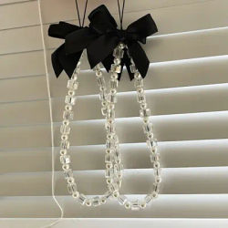 INS Pearl Crystal Bow cordino per cellulare cinturino da polso catena tenuta in mano da donna