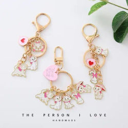 Kawaii Disney Marie chat porte-clés pendentif en métal dessin animé nouveau Airpods pendentif U disque Anti-perte sac d'école pendentif cadeau d'anniversaire