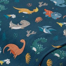 Tissu jersey de coton à impression numérique "dinosaures" avec élasthanne, bleu/coloré
