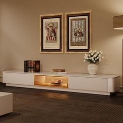 94.49" Modern Minimalist on the Ground TV Stand, Fluted TV Console, Glossy Sintered Stone,Hardware Handles, Beige TV Console