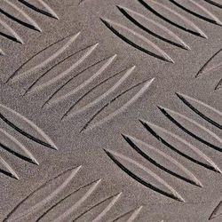 rouleau de tapis antidérapant motif larmé gris