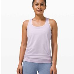Lululemon Athletica Tops | Lululemon Size 4 Lavender Dew Swiftly Tank! Good Condition ( No Rips Or Stains) | Color: Purple | Size: 4