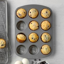 12 Cup Non Stick Metal Muffin Pan by Taste of Home in Ash Grey