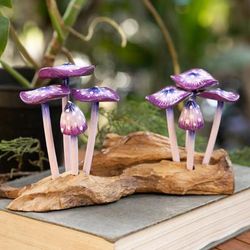 'Handcrafted Nature-Themed Purple Mushroom Wood Sculpture'