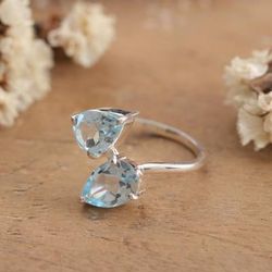 '4-Carat Pear-Shaped Blue Topaz Gems and Silver Cocktail Ring'