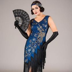 Anni Ruggenti Anni 1920 Lunghezza al ginocchio Abito Flapper Senza maniche Il grande Gatsby Paillettes Frange Scollo a V Costume Per donna Natale Carnevale speakeasy Mascherata Festa a tema retrò