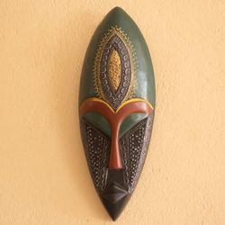 Face of Favor II,'Elongated Wood and Embossed Brass Aluminum African Wall Mask'
