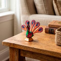 'Peacock-Themed Wood Alebrije Figurine with Floral Patterns'