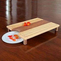 Treat of Taste,'Jobillo and Palo Blanco Wood Cutting Board with Four Legs'