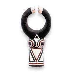 'Hand-Carved Painted African Wood Wall Mask with Horn Motif'