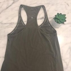 Lululemon Athletica Tops | Lululemon Green Razorback Tank Top. | Color: Green | Size: 10