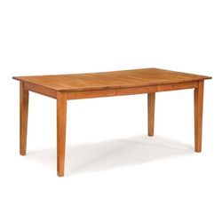 Dining Table by Homestyles in Oak