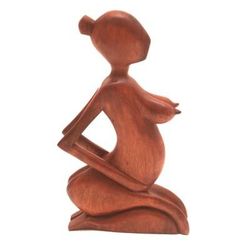 'Hand-Carved Maternity-Themed Wood Sculpture from Bali'