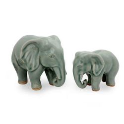Celadon ceramic statuettes, 'Lovely Family in Light Green' (pair)