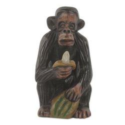 Ebony wood figurine, 'Banana Snack'