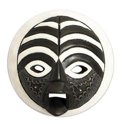 African wood mask, 'Rescued'