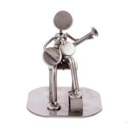 'Rustic Auto Part Eco-Friendly Sculpture of a Guitarist'