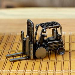 'Eco-Friendly Recycled Metal Forklift Figurine from Mexico'