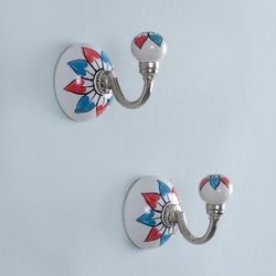 'Hand-Painted Floral Blue and Red Ceramic and Iron Hook Pair'