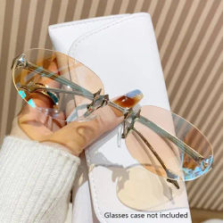 Lunettes de soleil ovales œil de chat sans cadre pour femmes, nouvelles lunettes de soleil haut de gamme, 2025