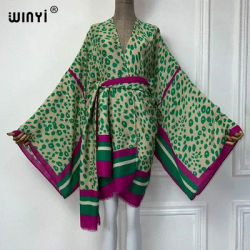 WINYI-Cardigan imprimé léopard semi-perspective pour femmes, vêtements de plage africains, couvertures, kimono, tenues de plage, robe de vacances, nouveau