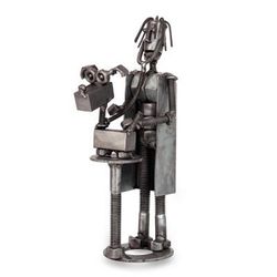 Veterinarian at Heart,'Recycled Metal Sculpture of a Veterinarian Examining a Dog'