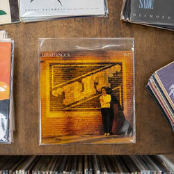 Protective Adhesive Flap Clear Album Sleeve - Fits Gramophone Records & Albums with 12" Covers Size: 12 11/16" x 12 3/8" 100 Bags