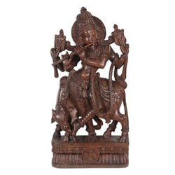 'Krishna and Bull Sculpture Hand-Carved in Teak Wood in India'