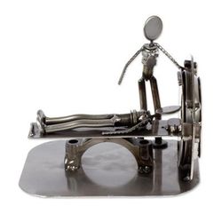Day at the Doctor,'Upcycled Metal Auto Part Sculpture from Mexico'