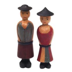 'Two Hand-Carved Wood Figurines of a Farmer Couple from Bali'