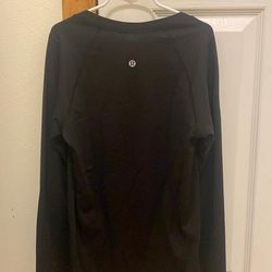 Lululemon Athletica Tops | Black Long Sleeve Lulu Top Size 4 Slightly Worn In Good Condition | Color: Black | Size: 4