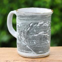 'Winter Leaf-Themed Blue Ceramic Mug with Antique Finish'