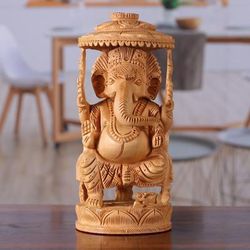 'Traditional Hand-Carved Kadam Wood Ganesha Sculpture'