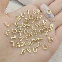 TEMU Minimalist Metal Alloy Nail Accessories Featuring The 26 English Letters For 3d Nail Decoration.