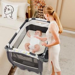 4 In 1 Portable Pack And Play Baby Nursery Center With Bassinet Multi Functional Playpen & Changing Table 4 In 1 Portable Pack And Play Baby Nursery Center With Bassinet Multi Functional Playpen & Changing Table