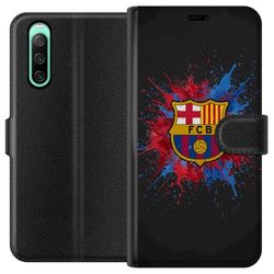 Kompatibel Tegnebogsetui til Sony Xperia 10 IV Barcelona Splash Art med FC Barcelonas emblem i blåt og rød perfekt til fodboldfans