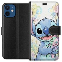 Kompatibelt Lommeboketui til Apple iPhone 12 Stitch holder en liten lappeteppe dukke blant pastellblomster.