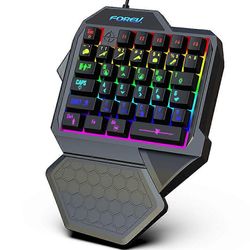 35 näppäimen RGB-taustavalaistu minipelinäppäimistö Ergonominen muotoilu rannetuella häikäisevä valo, sileä napautuspeliohjain PC-peliin Musta
