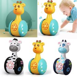 Baby Rangler Tumbler Doll Baby Leker Sweet Bell Musikk Roly-Poly Learning Leker Kyr