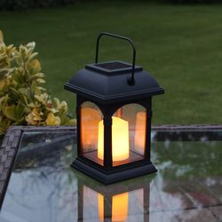 Linkrunning Matsort udendørs dekorative solcellelanterner med LED-stearinlys Vandtæt flimrende effekt (15 cm høj)