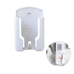 Ilmastointilaitteen kaukosäätimen pidikkeet Seinälle asennettu järjestäjäteline