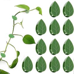 Pakkaus 50 itseliimautuvaa kasvipidikettä Kasviliitin Pidike Kiipeilykasvit Kiinnitysseinä Kasvipidikkeet yhteensopivat Tukee istutusta