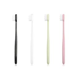 Pakkaus, jossa on 4 pehmeää manuaalista Micro Nano -hammasharjaa, joissa on 20 000 harjasta (valkoinen, musta, vaaleanpunainen, vihreä)