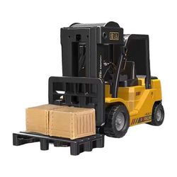 Kauko-ohjattava trukki laatikoilla/suihkuäänellä ja kevyellä lelupojan lahjalla